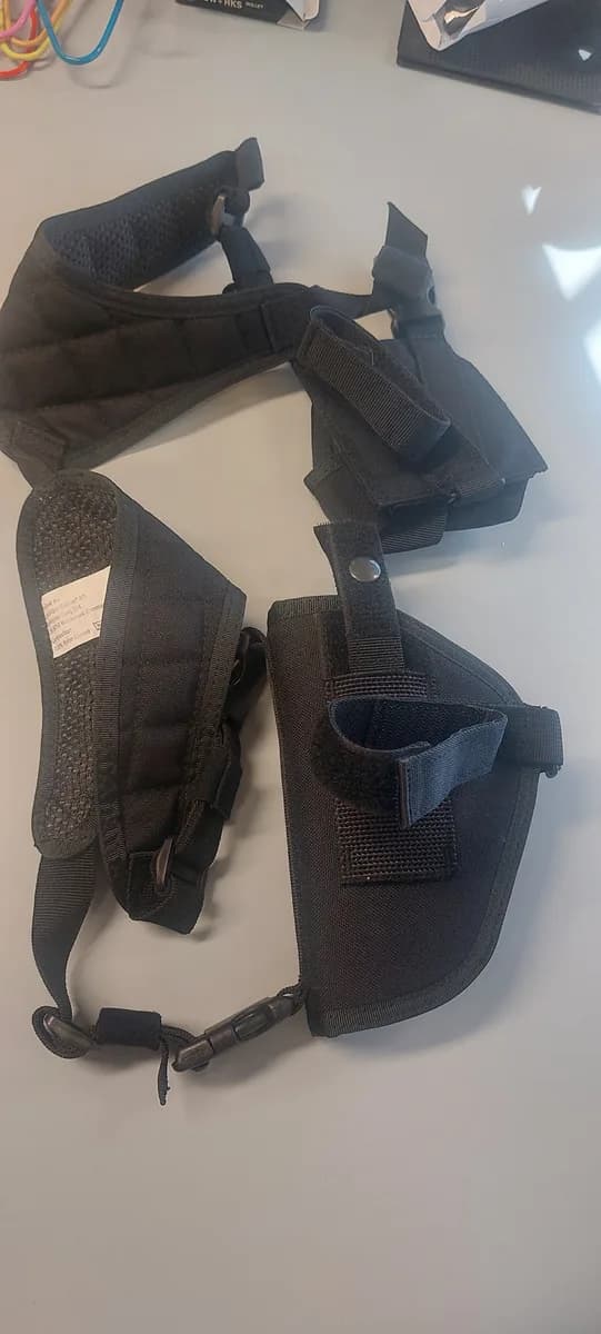 2 holsters neufs mini 8