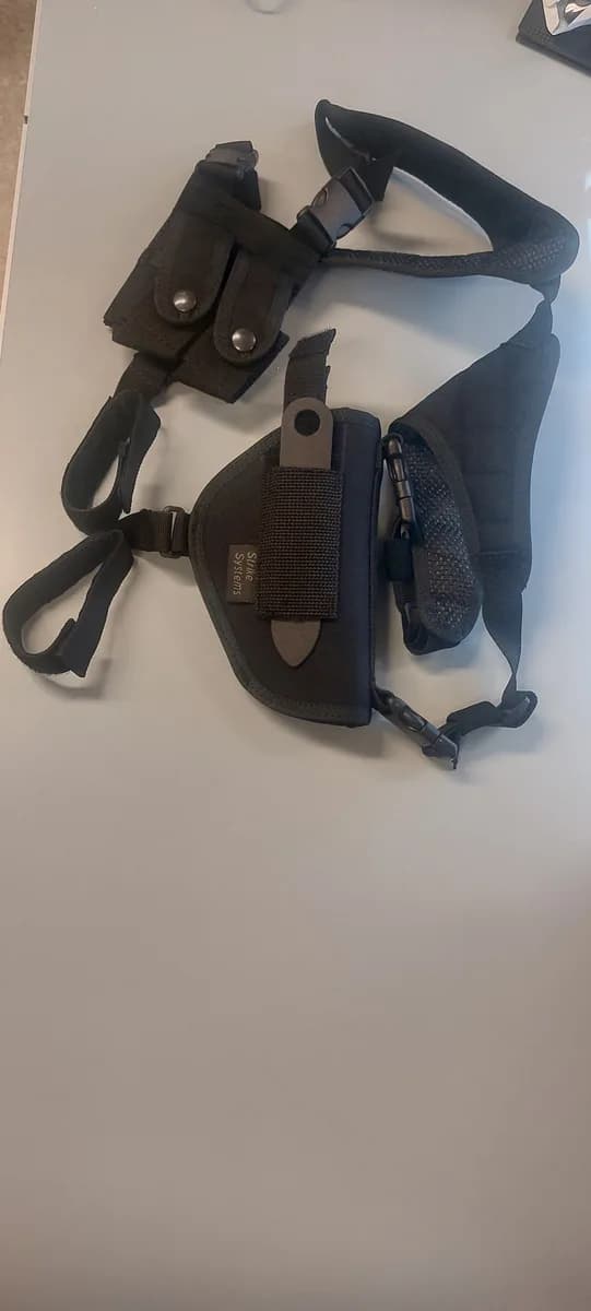2 holsters neufs mini 1
