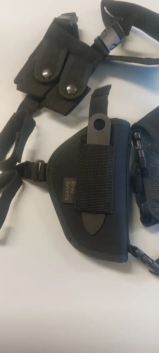 2 holsters neufs mini 7