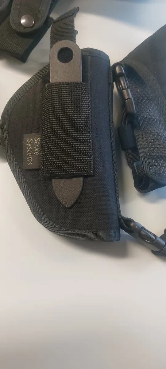 2 holsters neufs mini 6